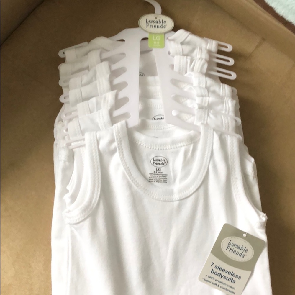 NWT-White sleeveless bodysuits 6-9mo